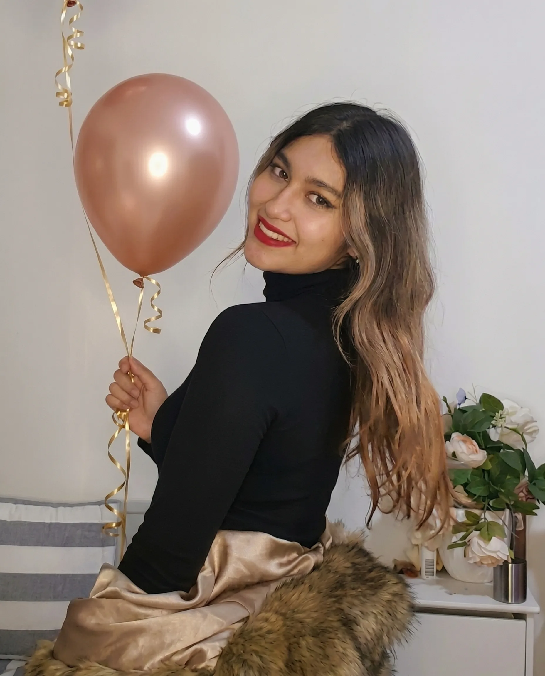 Brenda, the artist and founder behind Balloonia Events